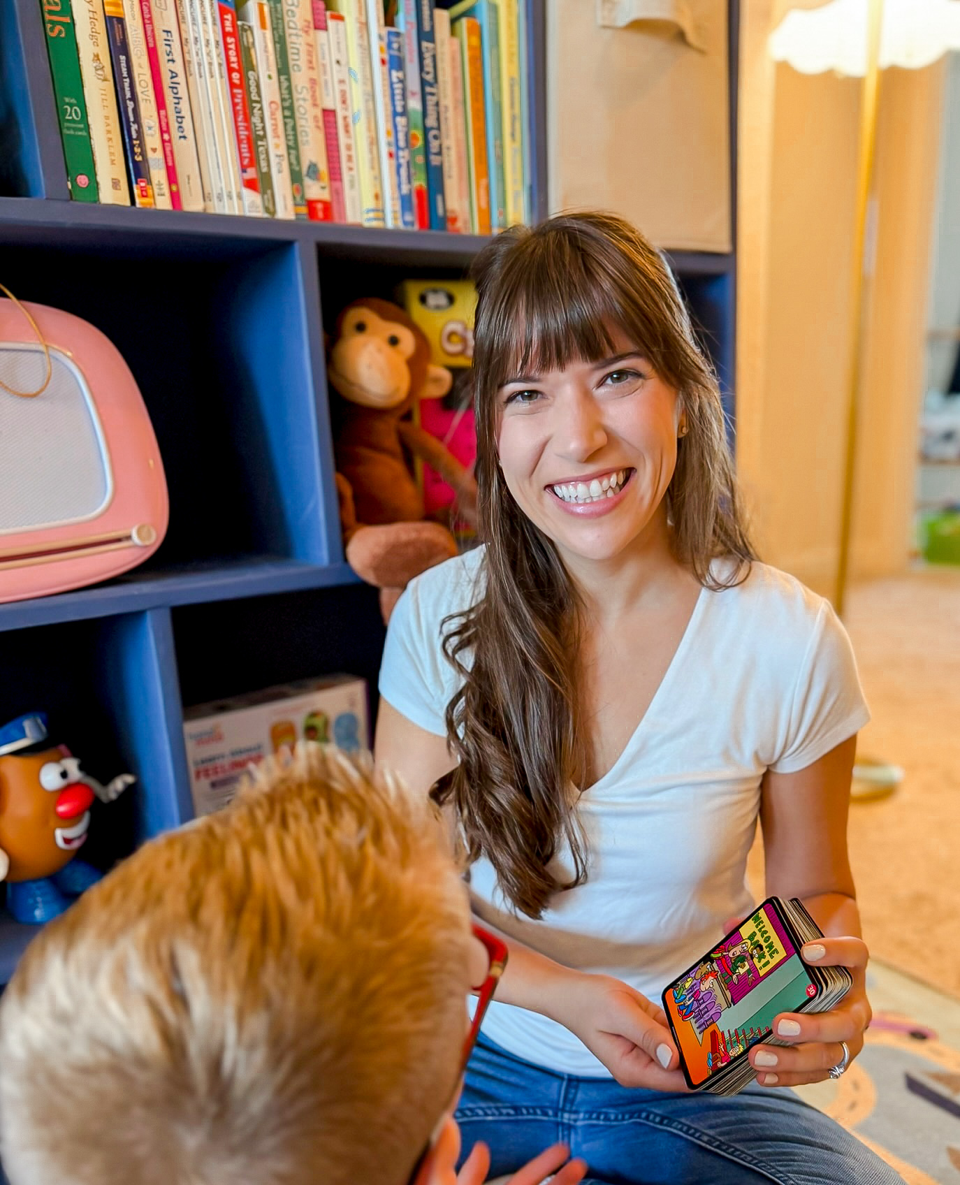 Sarah with a child and picture cards